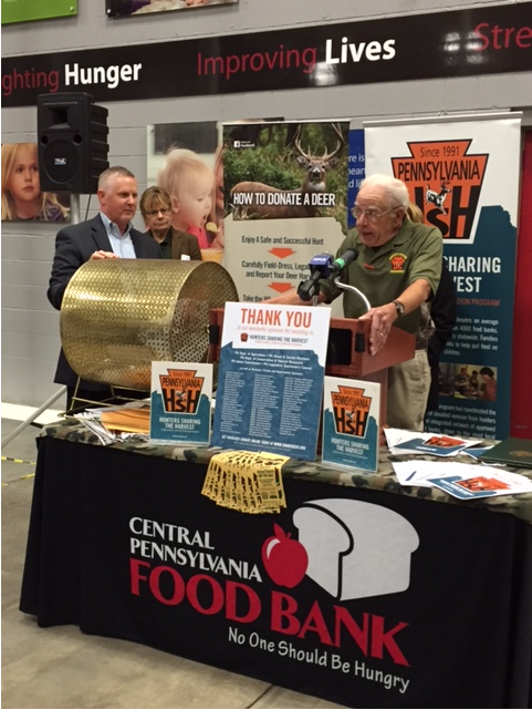 Pictured left to right getting ready to draw names for the Cabela's Gift Card giveaway  on Nov. 24, 2016 is Joe Arthur, executive Director of the Central PA Food bank, and John Plowman, executive director of Hunters Sharing the Harvest.